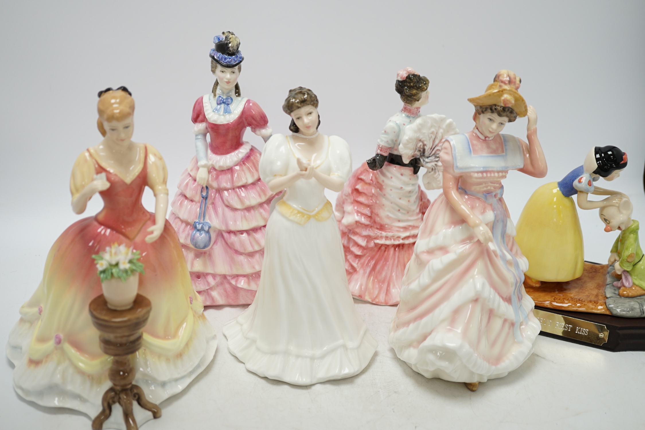 Five Royal Doulton figures including Diane, L’ambitieuse and Sharon, together with a Disney Showcase Collection figure, ‘Dopey’s first kiss’, all boxed. Condition - figures good, boxes poor to fair